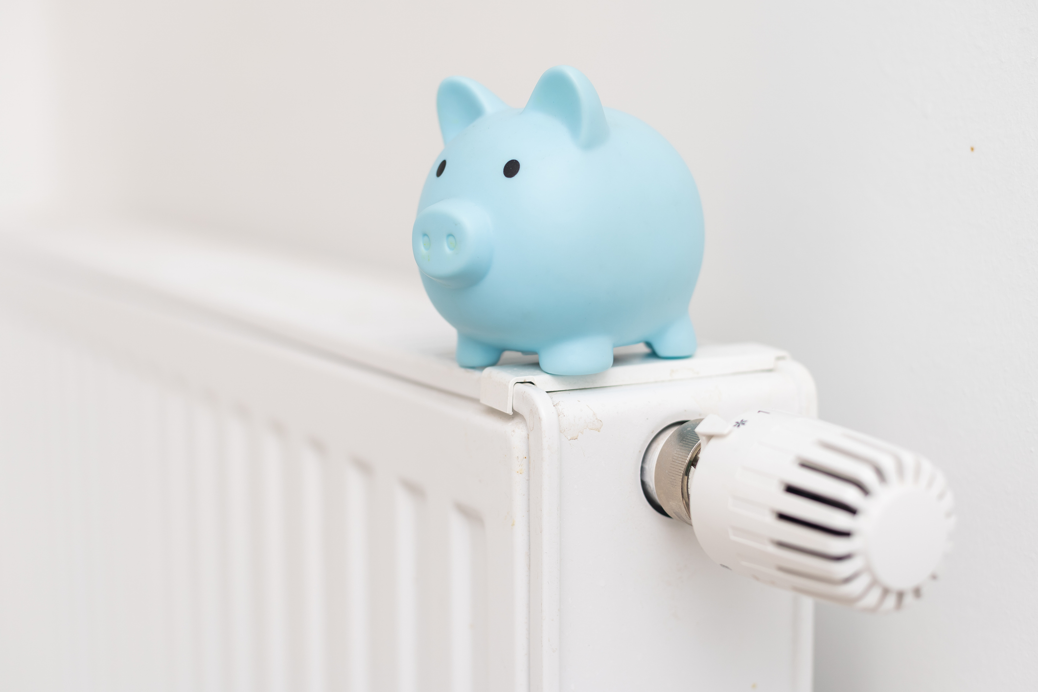 Heating battery with piggy bank on it. Stock-Fotografie-ID:1437873335